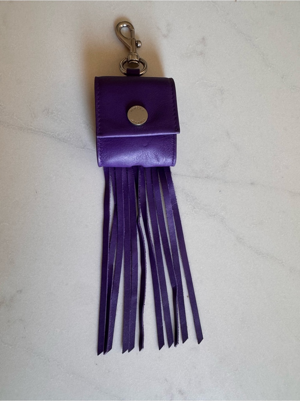 Rebecca Minkoff Purple Leather Fringe AirPod case with Keychain Clip